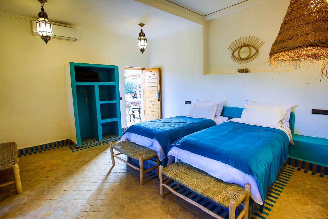 Riadsuerteloca Merzouga Hassilabied Luaran gambar A bedroom at the hotel